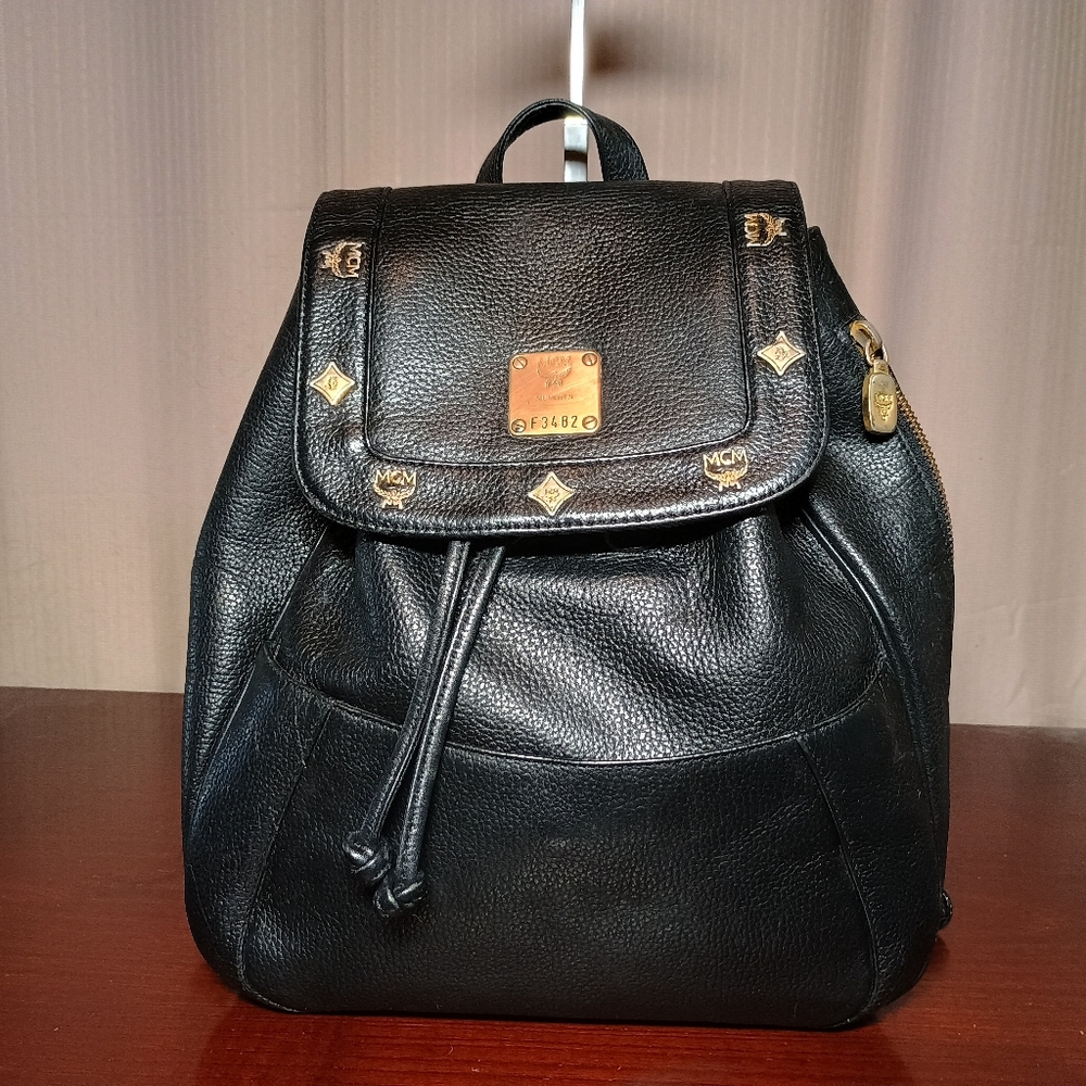 MCM Black Leather Backpack with Gold Details